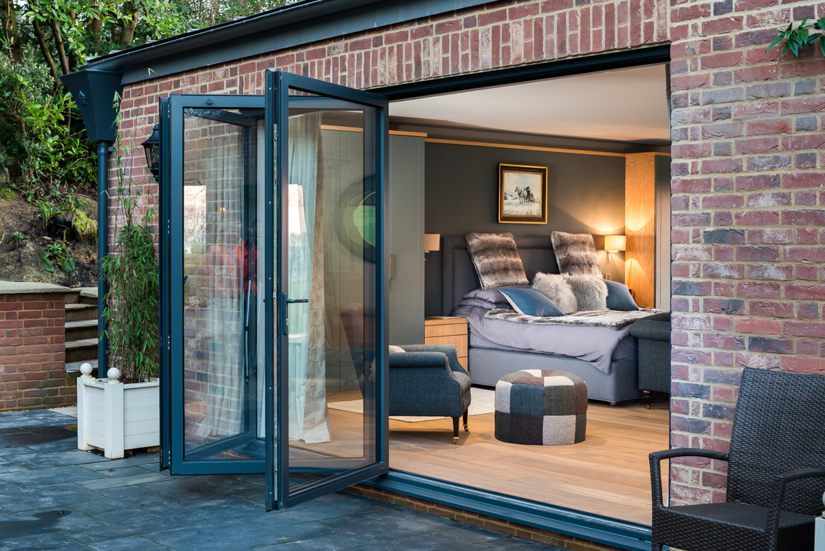 Stunning modern new bifold doors from 21st Century Conservatories & Fascias