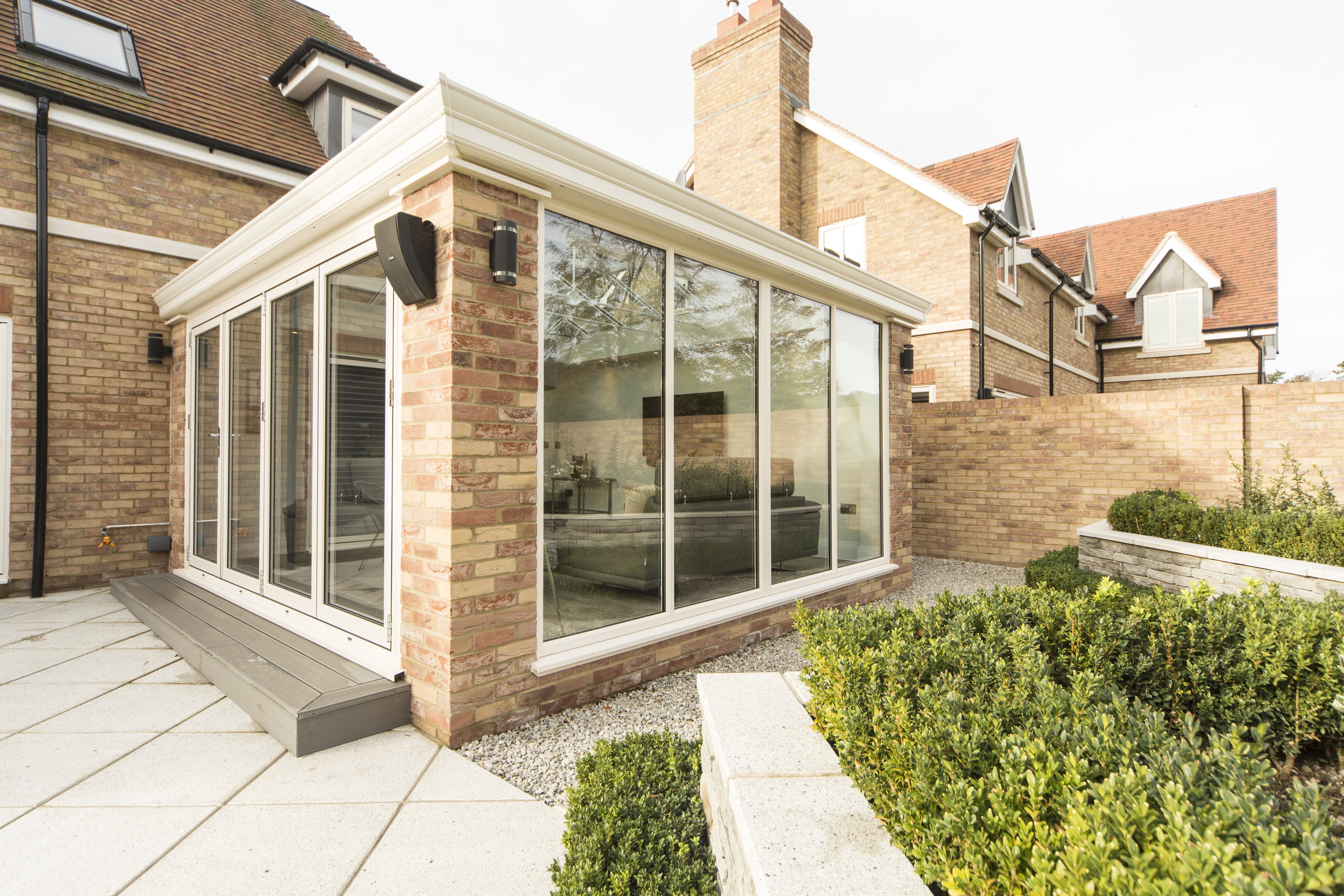 Front view of a 21st Century new conservatory installation with new french doors.