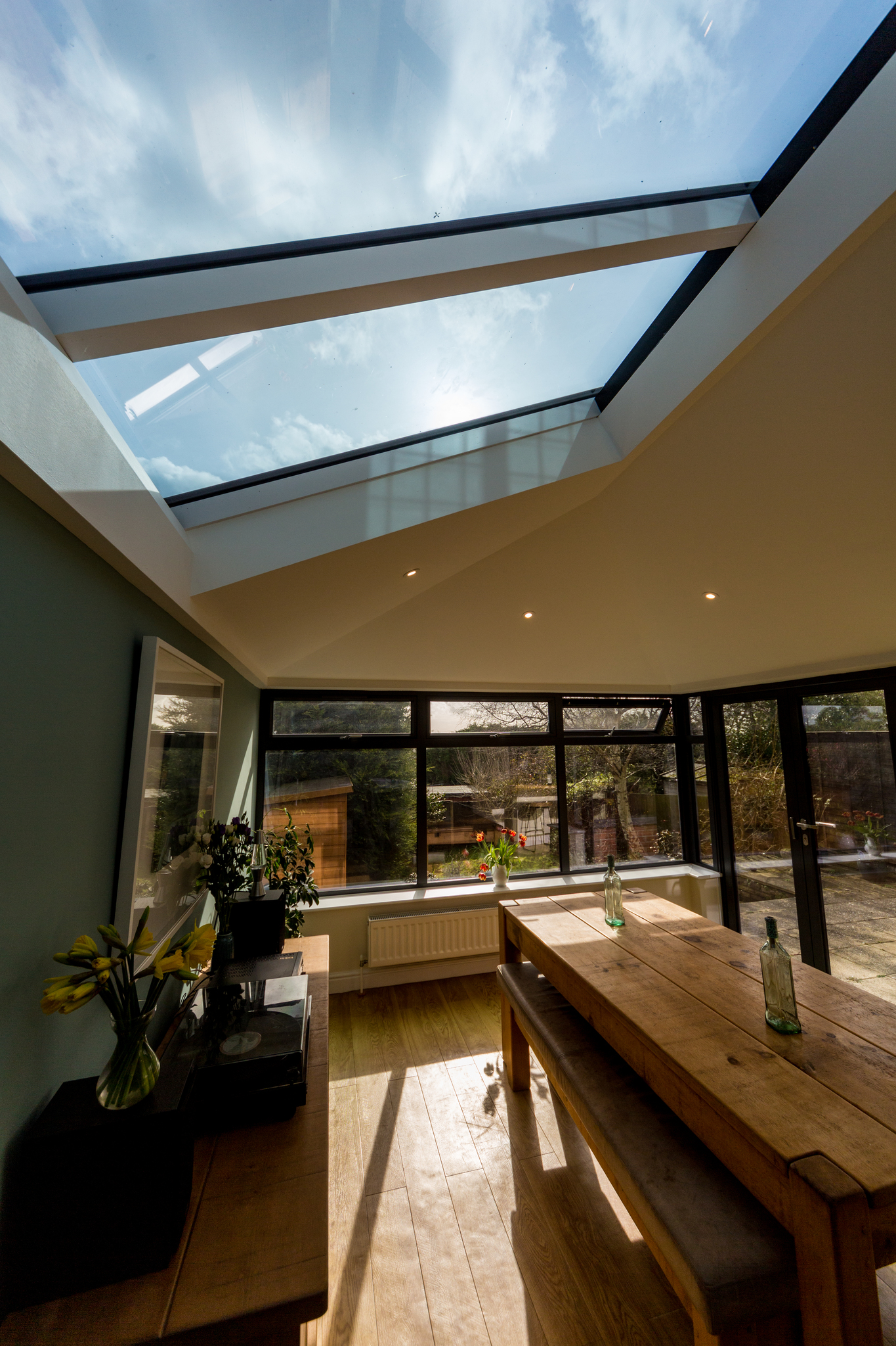 Radiant and roomy example of a conservatory and skylight design.