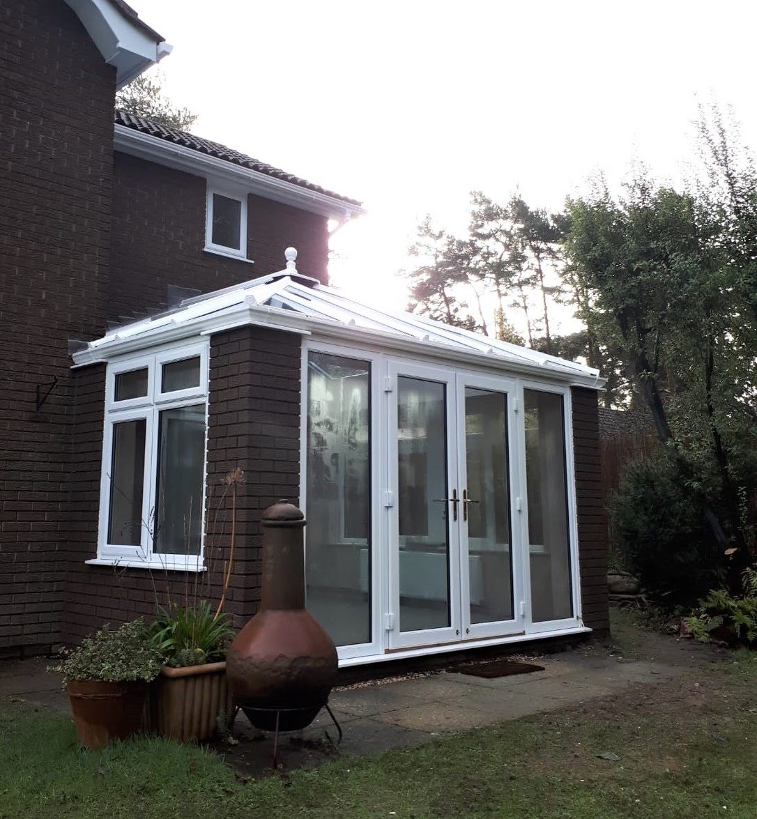 Brand new french doors and Livin room conservatory.