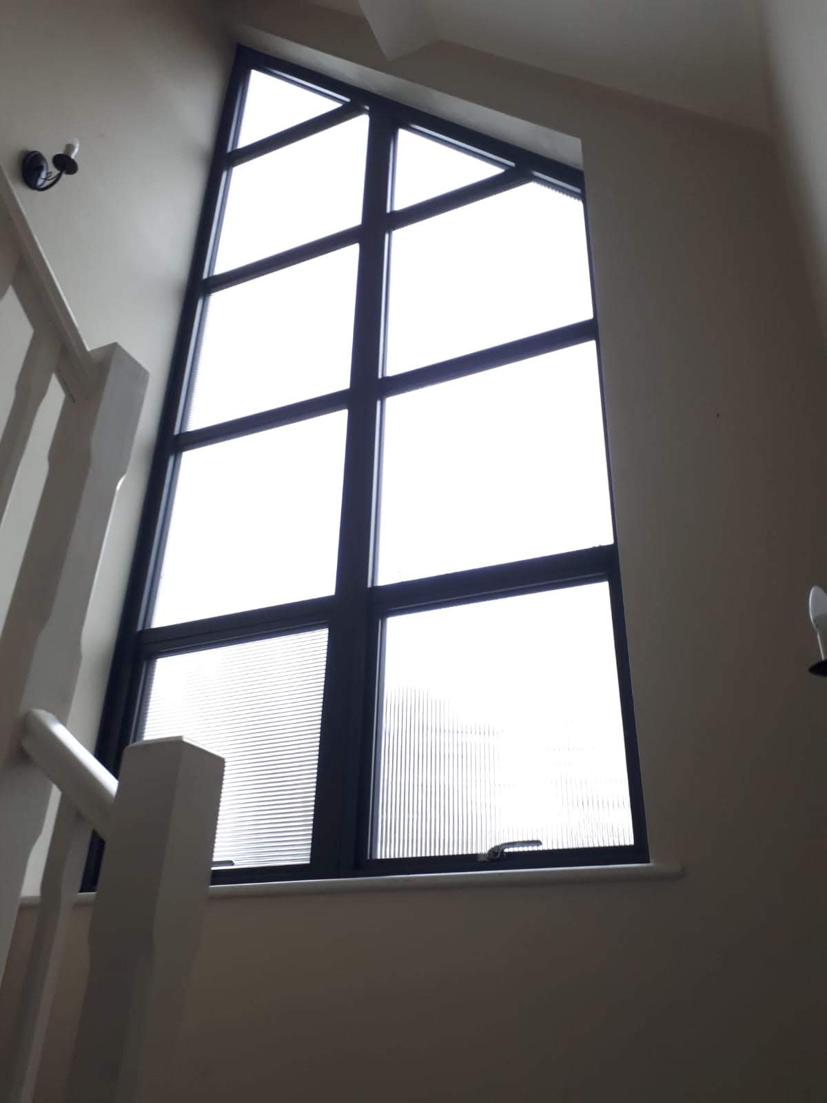 Inside view of a new shaped window installation.