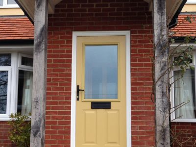 Bright yellow composite door design by 21st century.