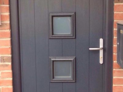 Grey modern composite door installation.