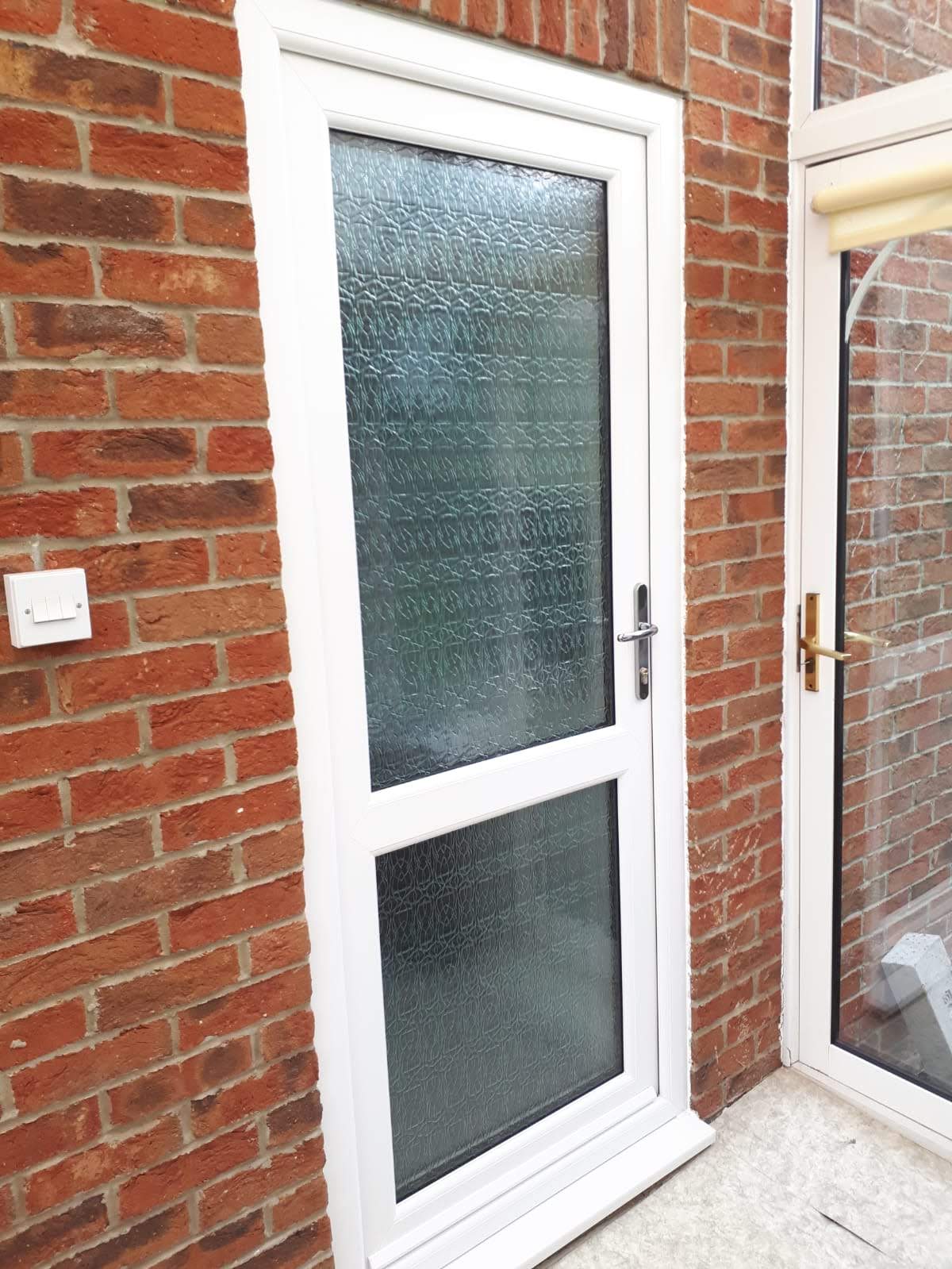 New PVC front door with glass.