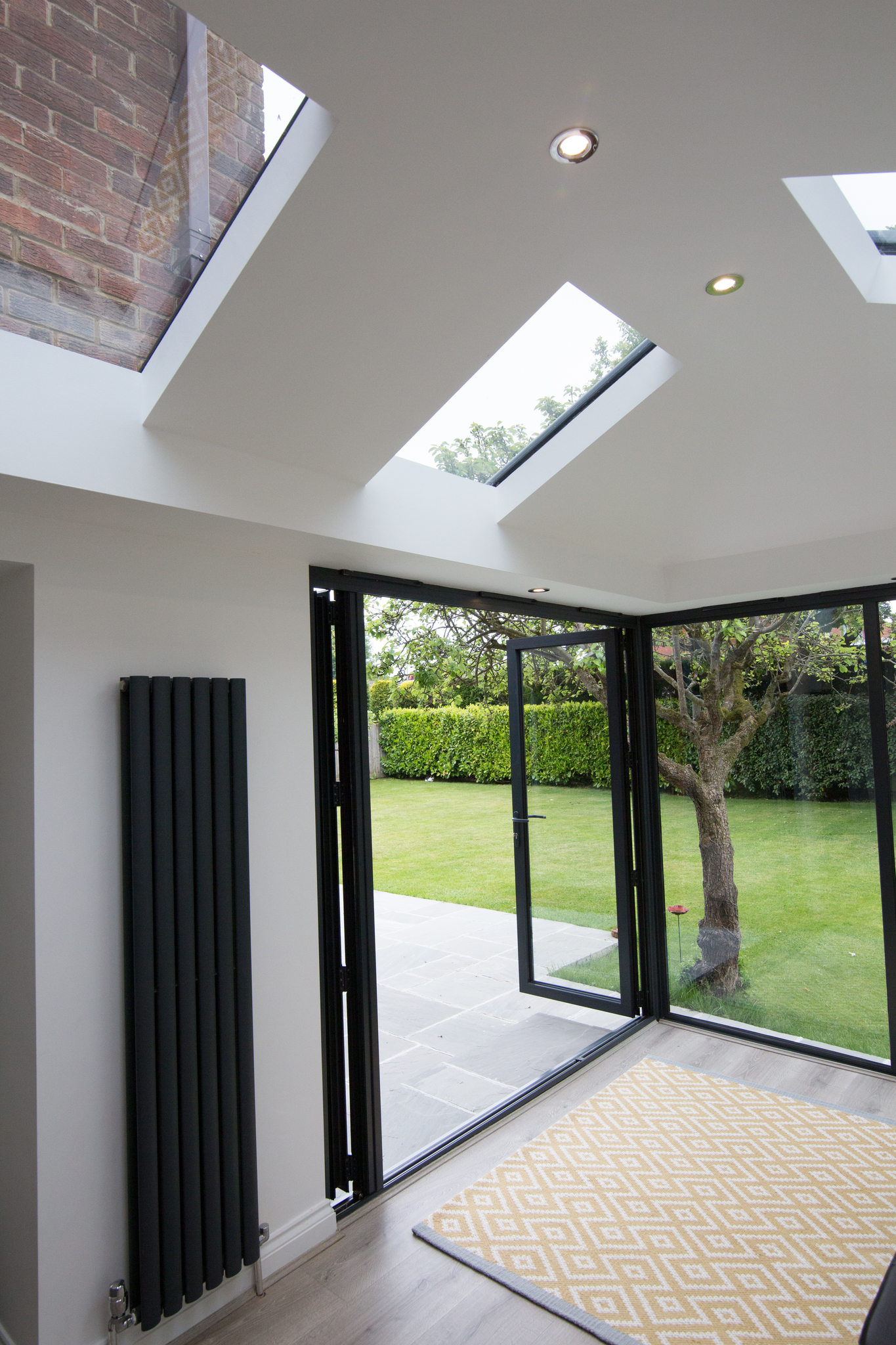 Inside shot of a Livin room conservatory model with wide french doors.