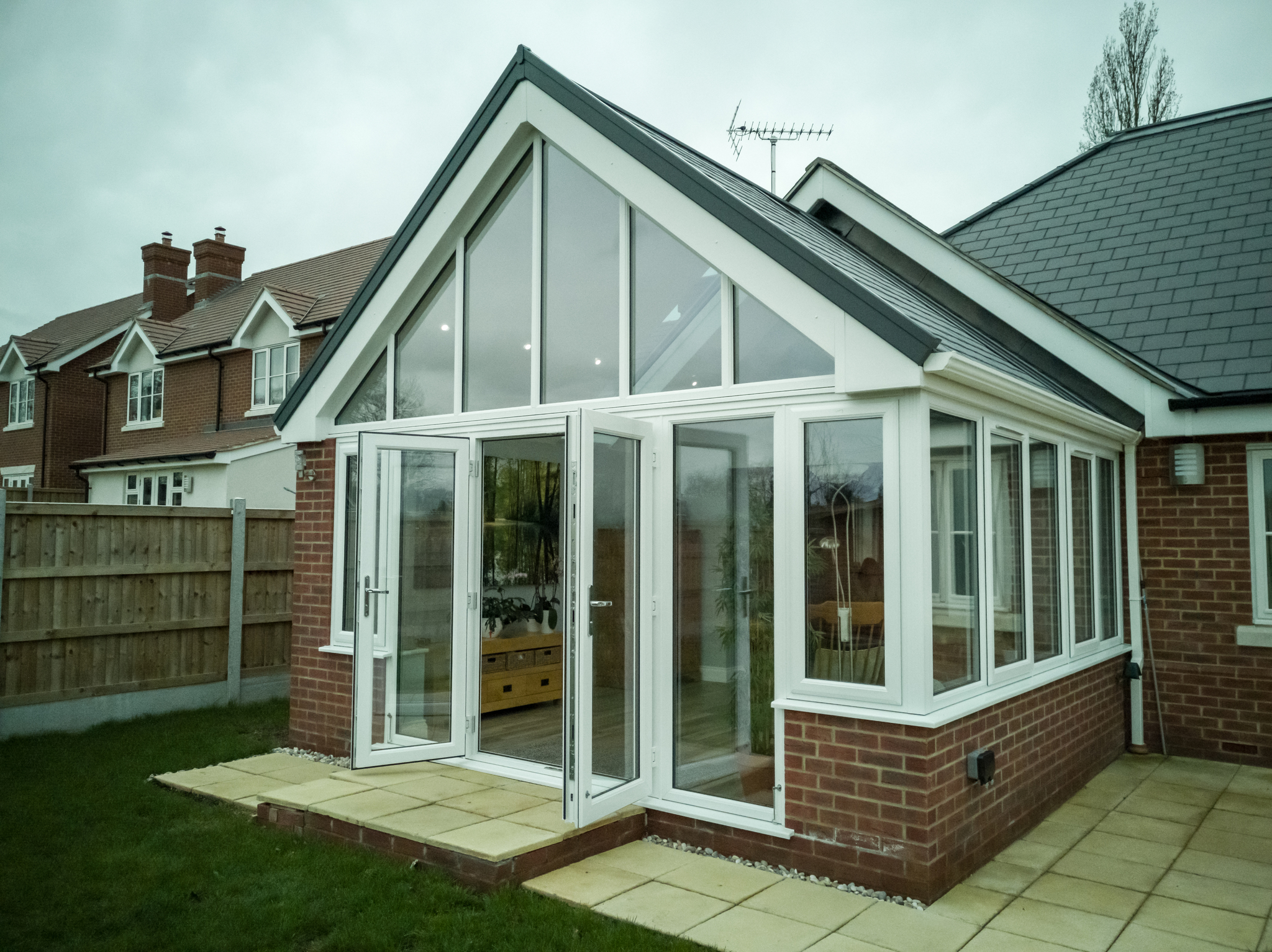 Front perspective of a lovely conservatory design created by 21st Century.